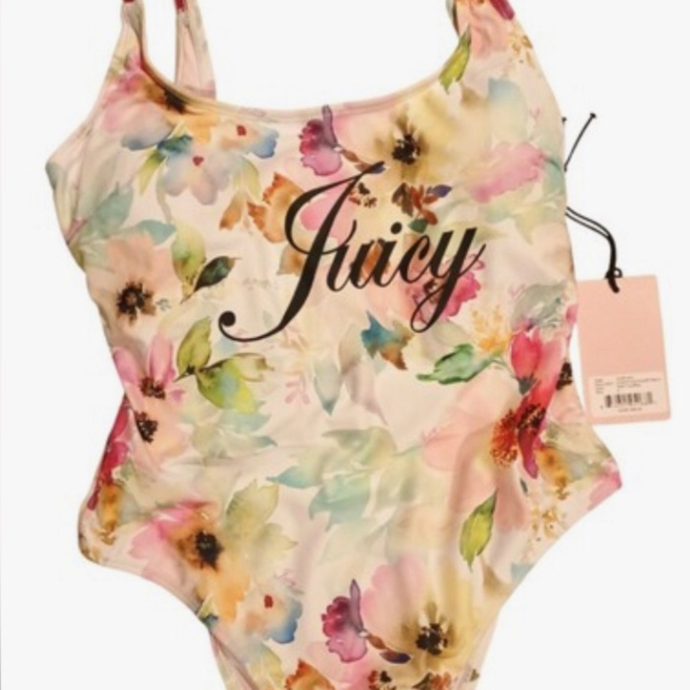Juicy Couture Pink Floral Swimsuit. Vibrant floral pattern. Stylish choice.